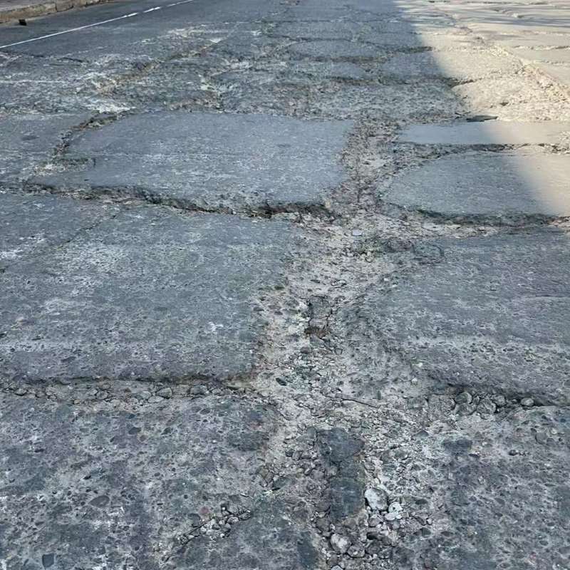 都匀路面起砂露石子修补料